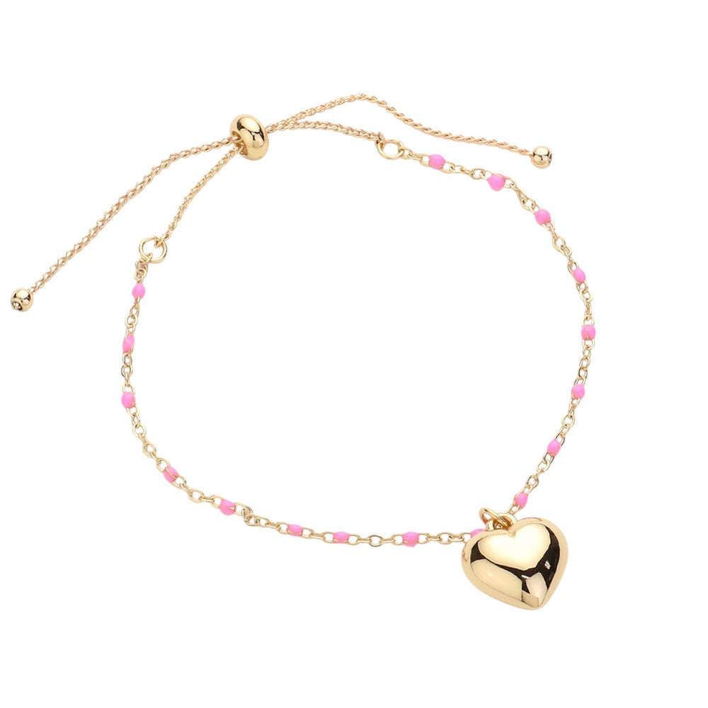 Pink Metal Heart Charm Beads Station Pull Tie Cinch Bracelet is a stylish and versatile accessory to add to your jewelry collection. The metal heart charm beads add a touch of elegance, while the pull tie cinch design allows for an adjustable and comfortable fit. Perfect for any occasion, this bracelet is a must-have for any fashion-forward individual