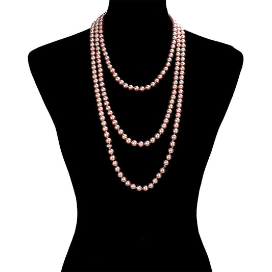 Pink Pearl Long Necklace, is the perfect marriage between timeless elegance and modern style. Handcrafted with pearls, this exquisite necklace is sure to become a staple in any jewelry wardrobe. Its contemporary design and luxurious materials make it a perfect choice for any occasion. Perfect occasional gift idea.