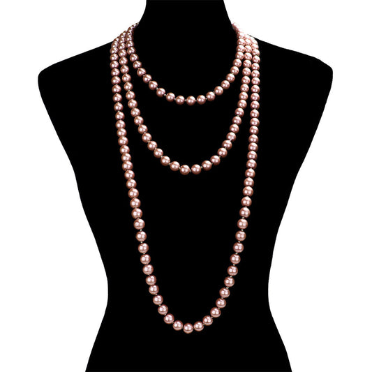 Pink Pearl Long Necklace, is the perfect marriage between timeless elegance and modern style. Handcrafted with pearls, this exquisite necklace is sure to become a staple in any jewelry wardrobe. Its contemporary design and luxurious materials make it a perfect choice for any occasion. Perfect occasional gift idea.