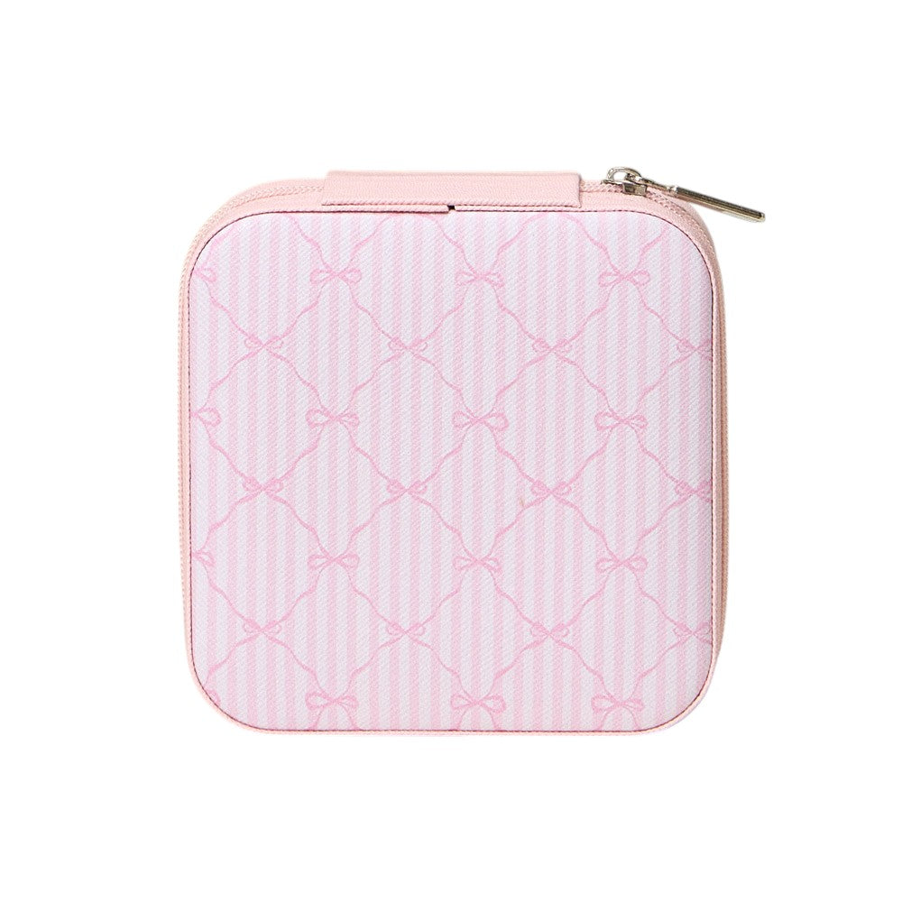 Pink  Pink Bow Pattern Portable Square Jewelry Box is perfect for storing and organising your precious jewellery. The elegant pink bow pattern adds a touch of style, making it a great addition to your dressing table or as a gift. Its compact size makes it ideal for travelling.