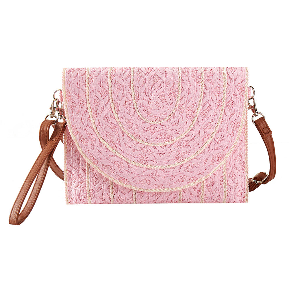Pink Stitch Detailed Straw Crossbody Bag is a must-have for any fashion-forward individual. The intricate stitching adds a unique touch to the classic straw material. With its convenient crossbody design, this bag is perfect for hands-free carrying and the perfect accessory for any summertime outfit. 