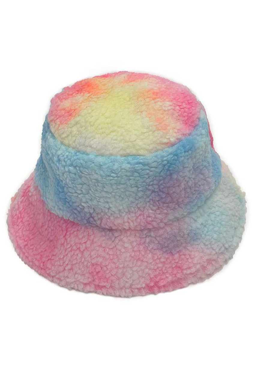Pink Tie Dye Teddy Bucket Hat combines playful aesthetics with practical sun protection. Each hat features a unique tie-dye pattern and adorable teddy bear embellishment, creating a statement accessory that elevates casual outfits. Constructed with quality materials for durability and comfort during extended wear.