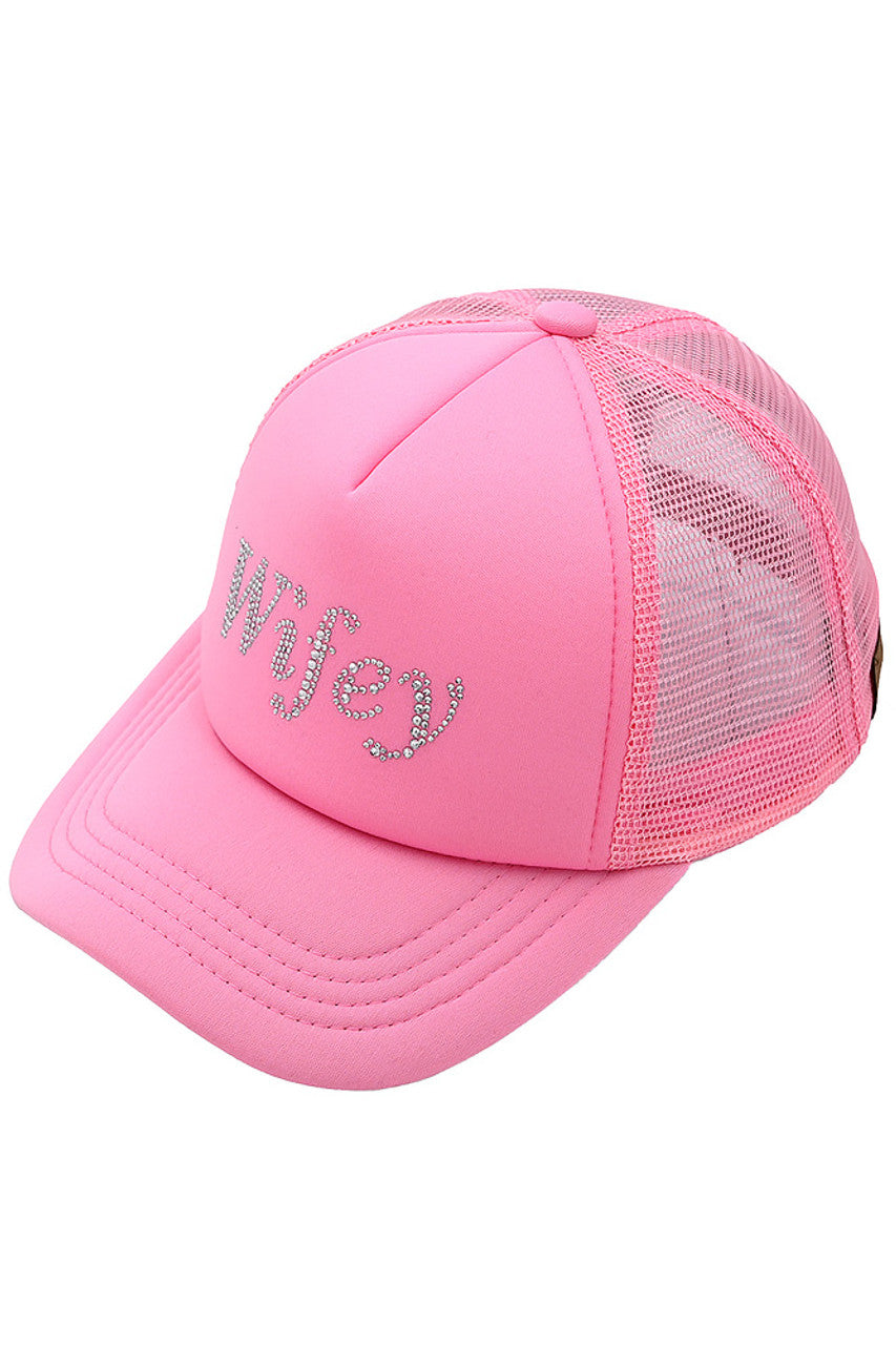 Pink C.C WIFEY Rhinestones Trucker Cap is a must-have for any stylish woman. With a dazzling display of rhinestones and a comfortable trucker design, you'll be turning heads wherever you go. Add a touch of glam to your daily look and show off your wifey status in style.