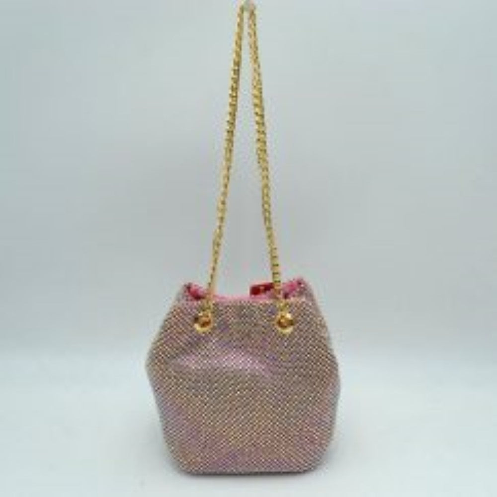 Pink This bucket bag features a shimmering, textured mesh exterior ideal for everyday use and evening transitions. The main storage compartment is designed with a gathered top entry that opens up for effortless access to your items. Two matching metallic link chain straps pull through circular metal grommets on the front and back, serving as a functional drawstring mechanism while doubling as a comfortable shoulder carry style.