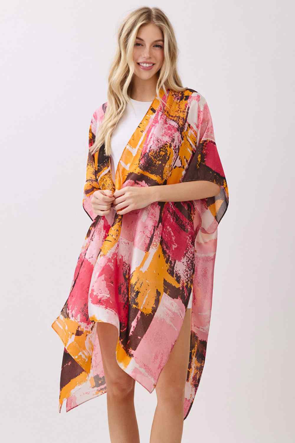 Pink Elevate your beach or resort wardrobe with this stunning Abstract Modern Art-Inspired Print Kimono. Crafted from 100% polyester with a luxuriously silky feel, this cover-up drapes beautifully over swimwear or casual outfits. The bold, contemporary print adds an artistic flair to any look, while the generous 35" x 36" dimensions provide comfortable coverage. Perfect for poolside lounging, beach days, or layering over your favorite pieces. Lightweight and easy to care for, this kimono is an effortless wa