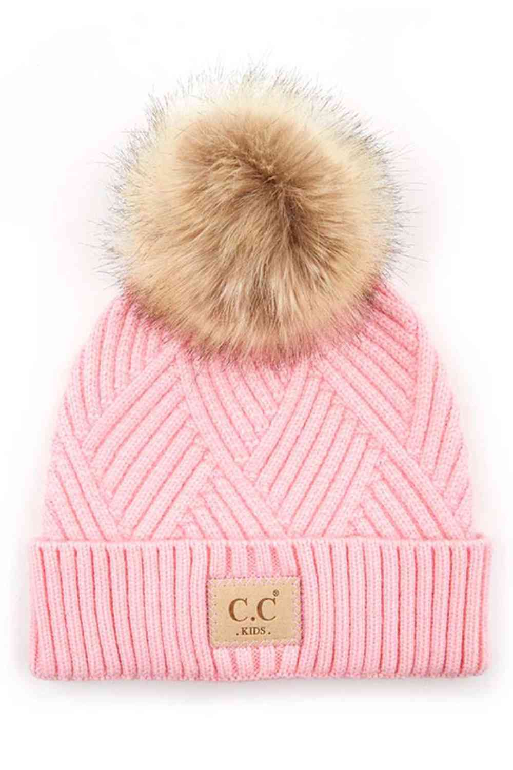 Pink Keep your little one cozy with this C.C Kids Knit Beanie, featuring a playful diagonal stripes criss-cross pattern. Crafted from a soft blend of 47% rayon, 31% PBT, and 22% nylon, this beanie offers warmth and durability for everyday wear.