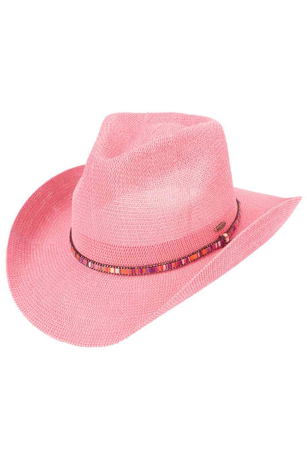 Pink Elevate your western style with this C.C Multi Colored Trim Band Knitted Cowboy Hat. Crafted from a breathable blend of 60% paper and 40% polyester, this one-size hat offers comfort and durability. The vibrant multi-colored trim band adds a pop of personality to any outfit. With a 3.25" brim and 4.5" crown height, it provides excellent sun protection while maintaining that classic cowboy silhouette. Perfect for ranch days, country festivals, or casual everyday wear. Circumference: 22.6".