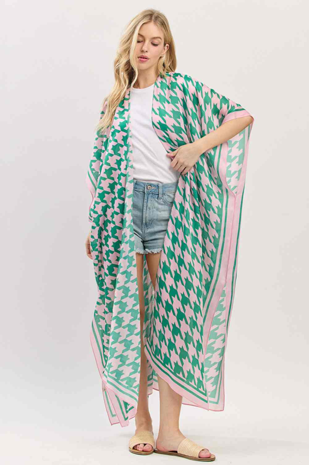 Pink Green Effortless summer style meets timeless elegance with this houndstooth pattern kimono. The open front design drapes beautifully over swimwear or casual outfits, while the generous 35" x 47.5" dimensions provide complete coverage for beach days and poolside lounging. Crafted from lightweight 100% polyester, it's breathable, quick-drying, and easy to care for. Perfect for layering over your favorite beach look or wearing as a standalone cover-up. Transition seamlessly from sand to dinner with this v
