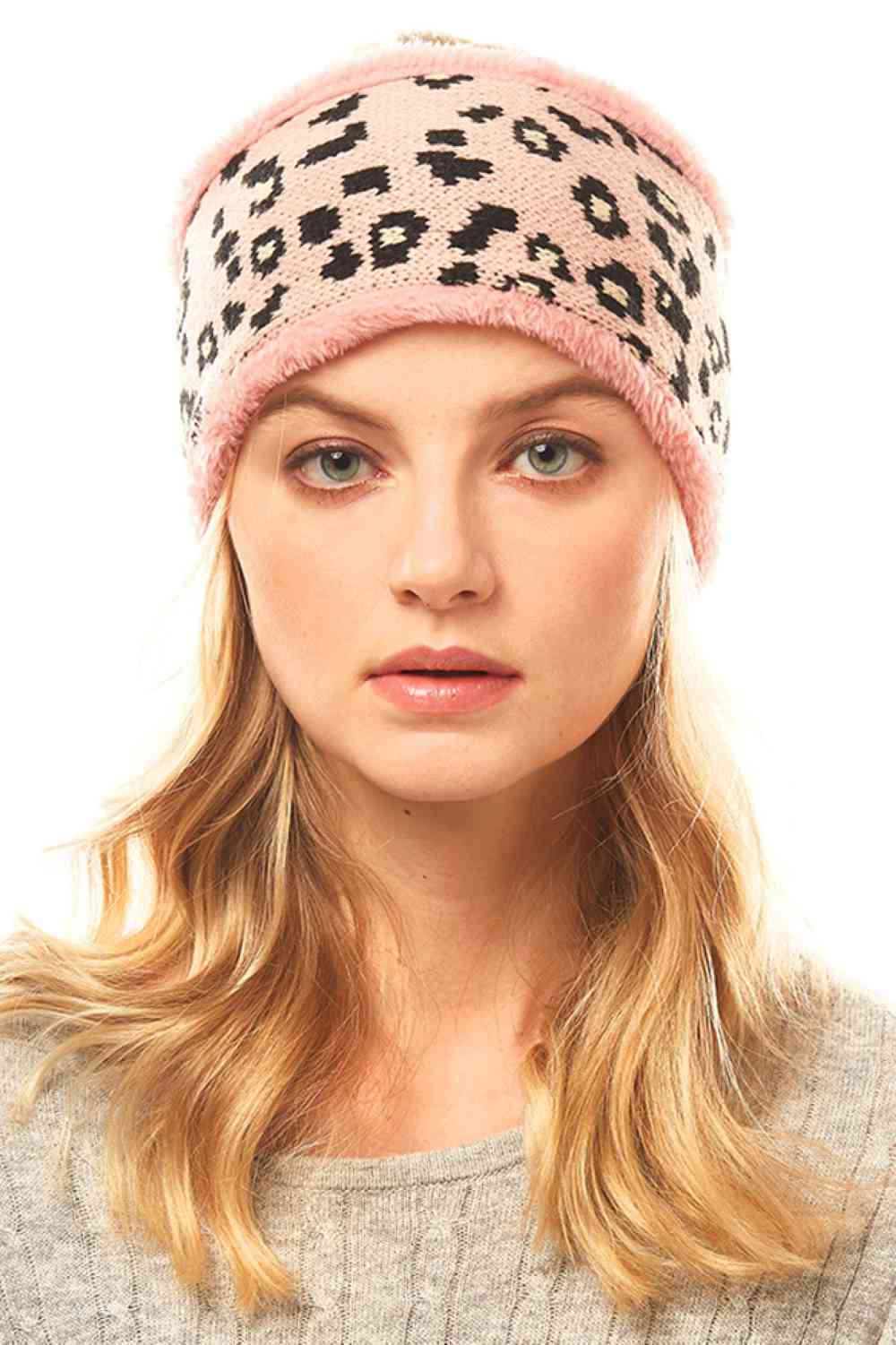 Pink Stay stylish with this eye-catching Leopard Print Headband. Crafted from a comfortable blend of 50% polyester and 50% acrylic, this versatile accessory measures 4" x 10" and fits one size. Perfect for keeping hair in place while adding a bold fashion statement to any outfit. Whether you're heading to the gym, running errands, or just want an instant style upgrade, this headband delivers both function and flair.