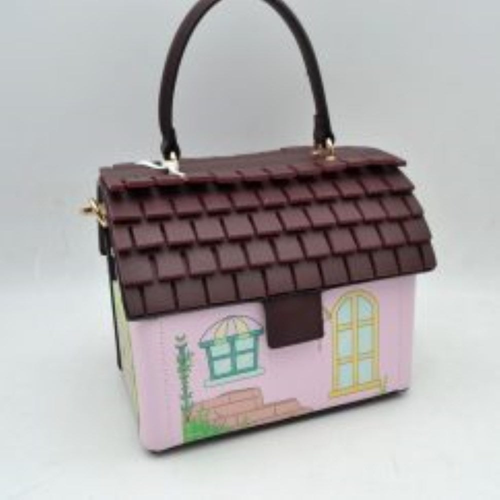 Pink Add a touch of playful charm to your accessory collection with this uniquely designed handbag, . Shaped like a cozy cottage, this structured bag features a dimensional tiered roof design that doubles as the main flap closure. The front showcases a delightful, illustrated house exterior complete with a window, door, and garden accents. Engineered for versatility, it comes equipped with a sturdy top handle and an adjustable, removable shoulder strap for effortless crossbody or over-the-shoulder wear. 
