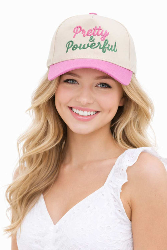 Pink Elevate your everyday style with this striking two-tone baseball cap featuring an embroidered "PRETTY &amp; POWERFUL" letter design. Crafted from 100% cotton, it offers breathable comfort perfect for all-day wear. The classic one-size-fits-most fit ensures a flattering look for everyone. Whether you're making a bold statement or adding a touch of personality to your outfit, this cap combines attitude with comfort. A versatile accessory that works with casual looks, athleisure, or streetwear styling.