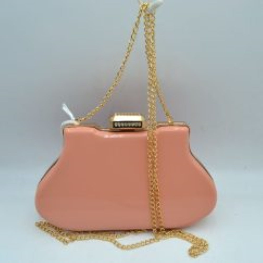 Pink This elegant evening clutch bag features a vibrant glossy hard-shell finish and a structured, curved silhouette, making it a sophisticated addition to any special occasion. The secure top frame is fastened with a striking rectangular gold-tone clasp adorned with sparkling rhinestones. Equipped with a delicate, detachable metallic chain-link shoulder strap, this sleek accessory offers a classic look and convenient hands-free styling options.