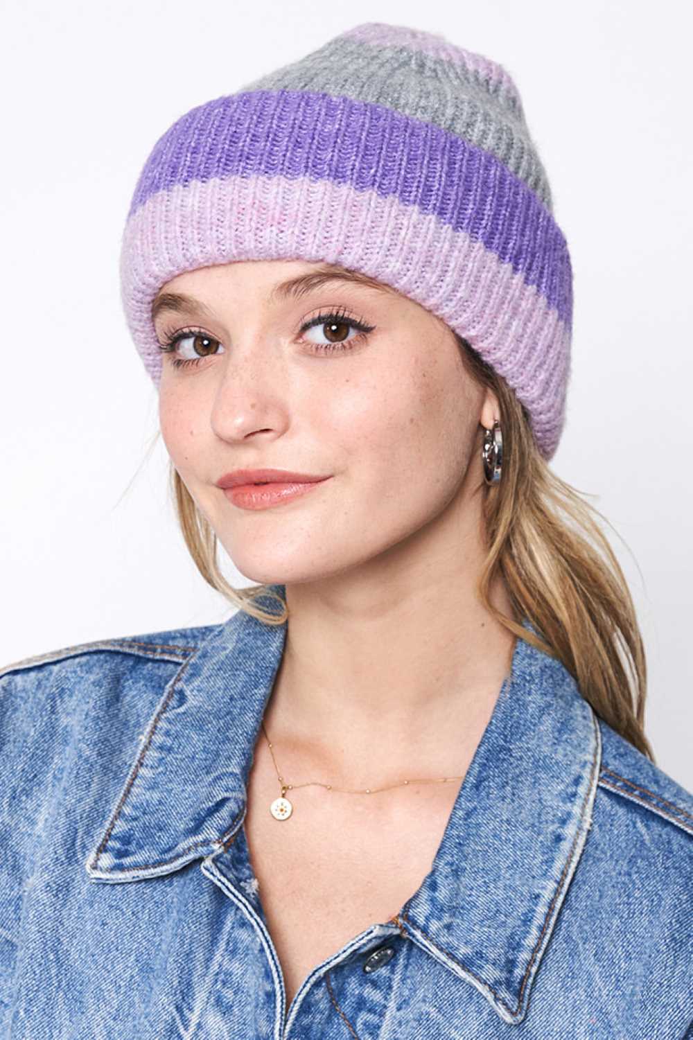 Pink Stripe Color Block Ribbed Beanie features bold striped color-block detailing with a ribbed knit texture for a modern, sporty winter look. Designed with a soft stretch fit, it delivers cozy warmth and everyday comfort while adding standout style to your cold-weather outfits.