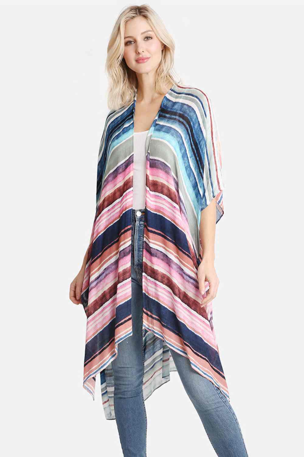 Pink Effortless summer style meets comfort in this versatile kimono cover-up. Crafted from 100% viscose, the soft, breathable fabric drapes beautifully over swimwear or casual outfits. The vibrant multi-color stripe pattern adds visual interest to any beach or poolside look. Generously sized at 38" x 39", it offers relaxed, flowing coverage perfect for warm-weather days. An essential piece for your seasonal wardrobe.