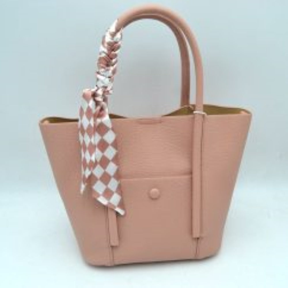 Pink Elevate your everyday style with this chic and highly functional tote bag. Crafted with a premium pebbled exterior finish, this structured handbag offers a sophisticated texture that handles daily wear with ease. The front features a convenient open slip pocket secured by a matching central snap closure, providing quick access to small essentials. Adding a modern, graphic contrast, a silky checkered pattern scarf comes beautifully wrapped and tied along the front handle base. 