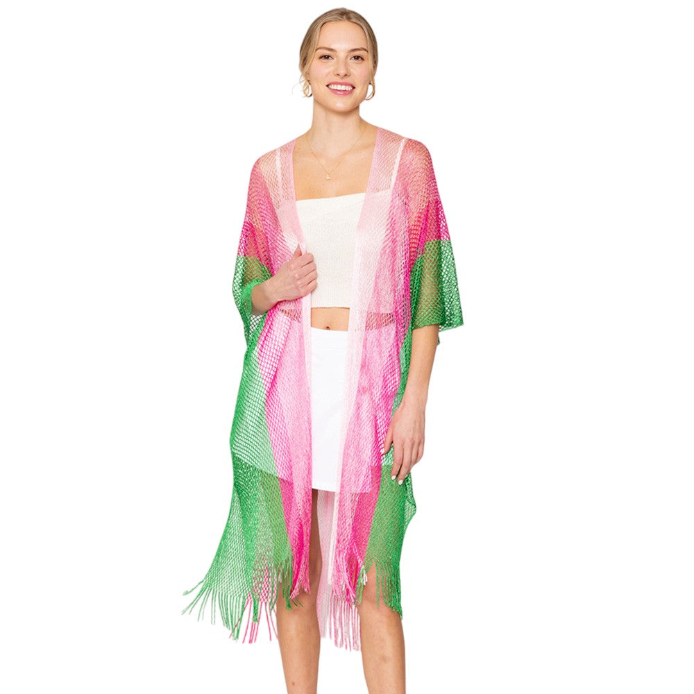 Pink & Green Two Tone Lurex Kimono Poncho is a versatile and stylish addition to any wardrobe. Made with a unique Lurex fabric, it adds a touch of shimmer to your outfit. Its kimono design offers a comfortable and flattering fit, making it suitable for any body type. Perfect for adding a pop of color and sparkle to your outfit. 