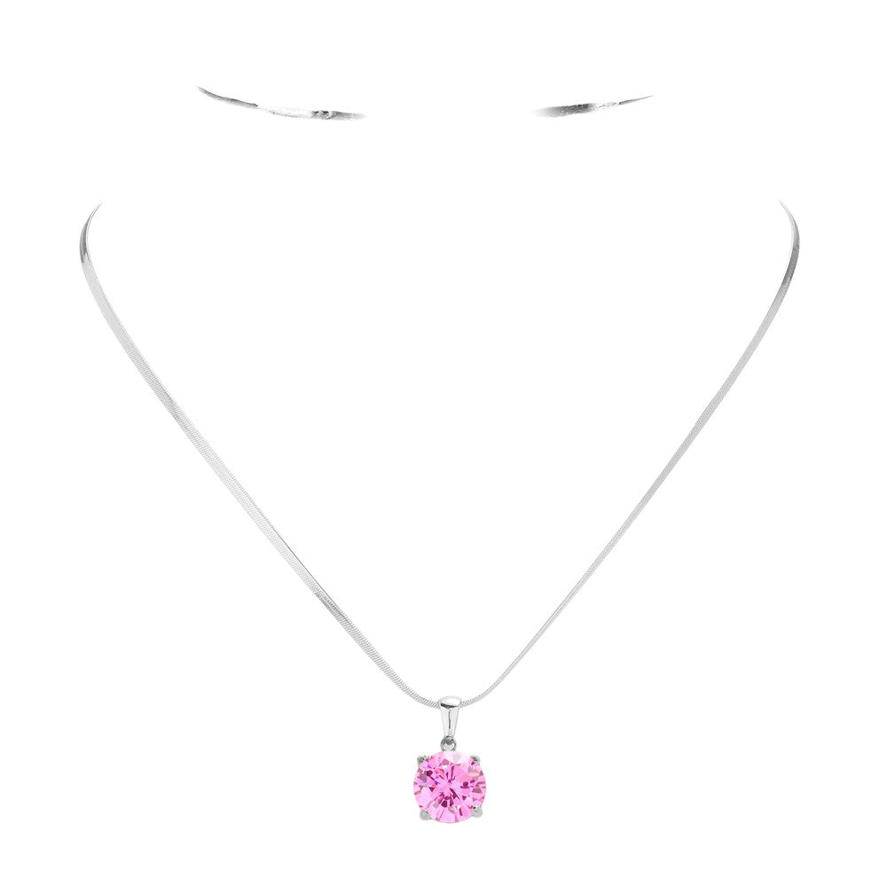 Pink Stainless Steel CZ Round Pendant Necklace is a stylish and durable accessory. Crafted from high-quality stainless steel, this necklace is resistant to tarnishing and fading. Featuring a sparkling CZ round pendant, it adds a touch of elegance to any outfit. Upgrade your jewelry collection with this timeless piece. 