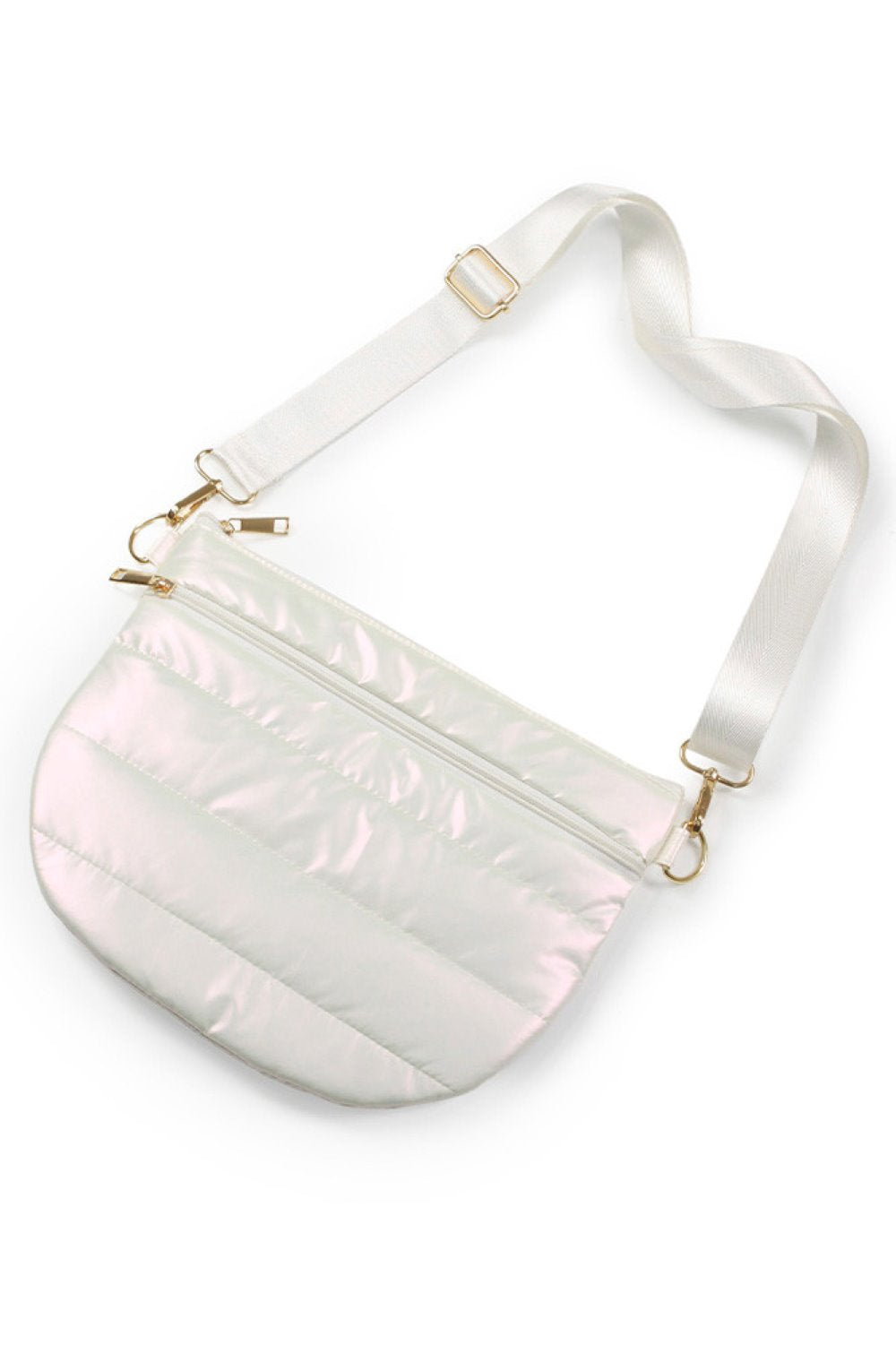 platinum The Puffy Half Moon Bag brings playful style to your everyday carry. Its distinctive half-moon silhouette offers a modern twist on classic bag design, while the soft, puffy construction adds dimension and visual interest. Crafted from durable 100% polyester, this bag is built to withstand daily use while maintaining its shape. The compact 11.5" x 8" size fits essentials perfectly ideal for quick outings, travel, or as a statement accessory.