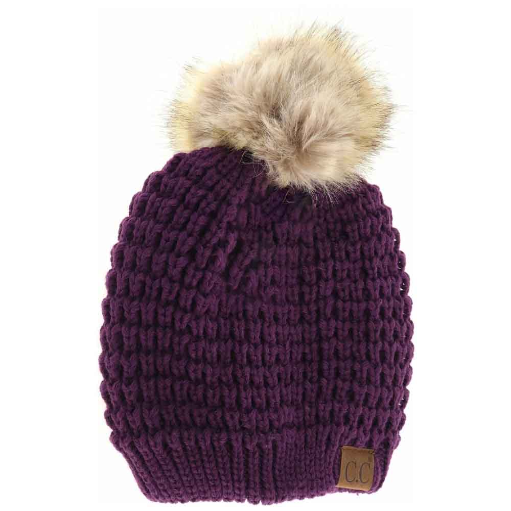 Purple Solid Waffle Stitch Fur Pom C.C Beanie combines classic waffle stitch knitting with a plush fur pom for an elevated winter accessory. Crafted for warmth and style, this beanie offers a comfortable fit that retains heat without bulk. Its timeless design makes it a versatile piece, suitable for both casual and refined cold-weather looks. Perfect for those seeking expert-level comfort and fashion in one essential hat. 