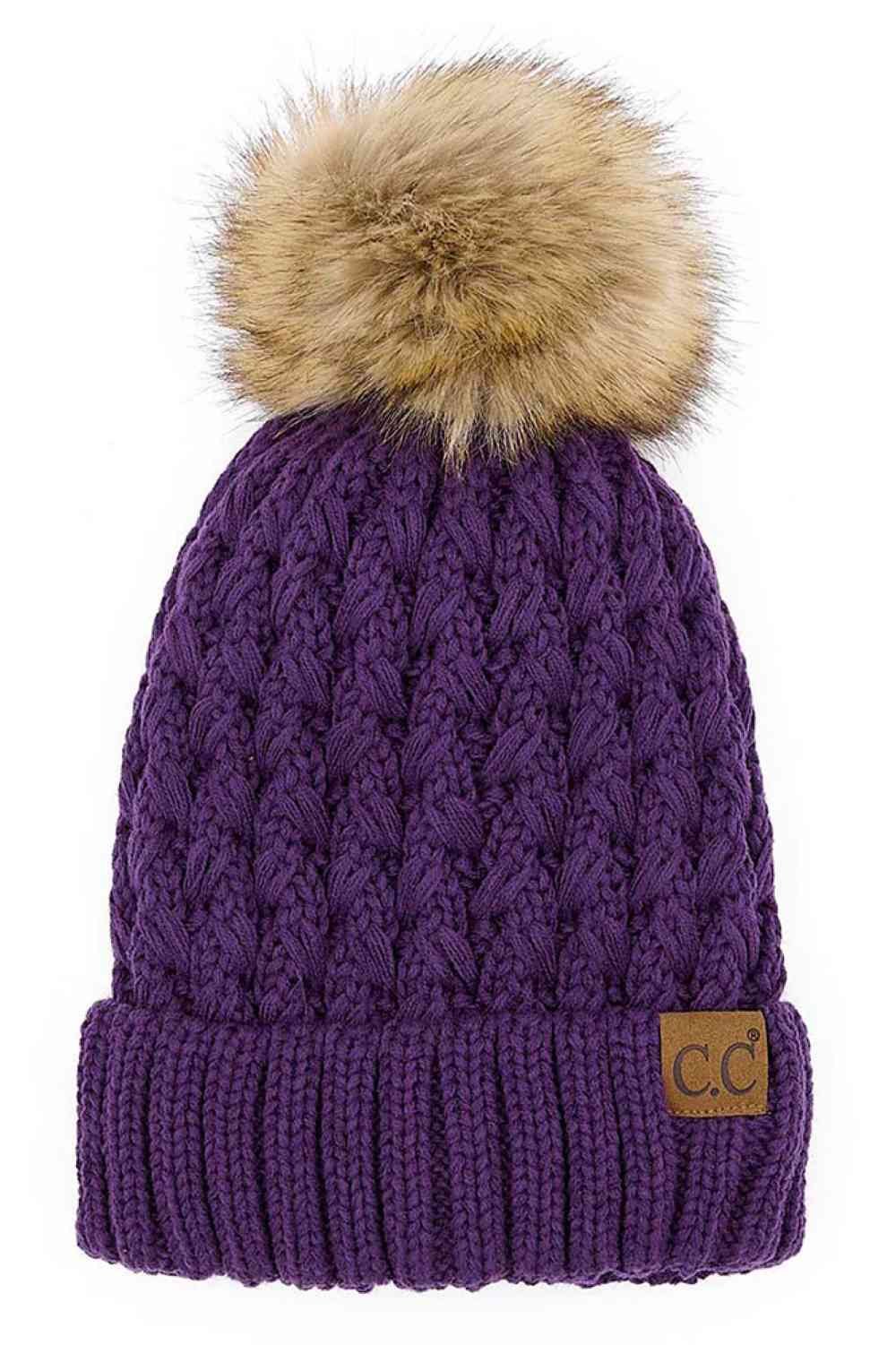 Purple Elevate your winter wardrobe with the C.C Lattice Crossover Stitch Beanie, featuring an intricate lattice pattern and cozy pom detail. Crafted from 100% soft acrylic, this beanie delivers warmth and comfort without the weight. The crossover stitch design adds visual interest while the relaxed fit suits most face shapes. Perfect for layering over your favorite winter looks, this versatile beanie transitions effortlessly from casual outings to outdoor adventures. One size fits most for easy, everyday w