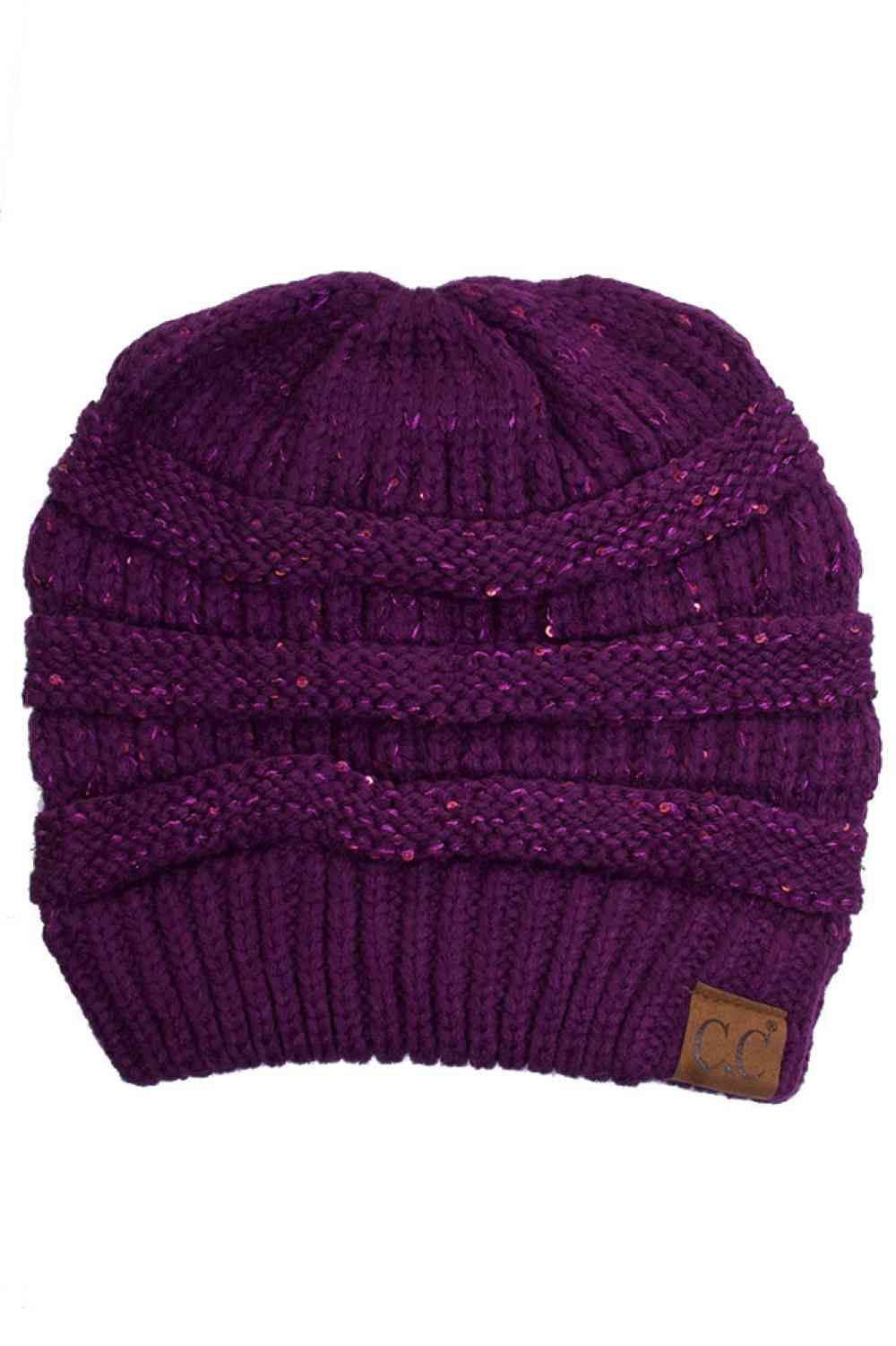 Purple Sparkle through the season with the C.C Sequin Knitted Soft Beanie, where style meets warmth. This cozy 100% acrylic beanie features eye-catching sequin detailing that adds a touch of glamour to your winter look. The soft, lightweight knit construction keeps you comfortable without bulk, perfect for layering or wearing solo. Whether you're heading out for casual errands or outdoor adventures, this versatile beanie transitions effortlessly from day to night. One size fits most for convenient, year-rou