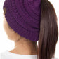 Purple The C.C Solid Color Ponytail Messy Bun Beanie combines comfort with versatility for effortless everyday style. Crafted from 100% soft acrylic, this beanie features an open crown design that accommodates ponytails and messy buns while keeping you warm. The one-size-fits-most construction ensures a secure, flattering fit for virtually anyone. Perfect for casual outings, workouts, or relaxed weekends, this practical accessory transitions seamlessly from season to season.