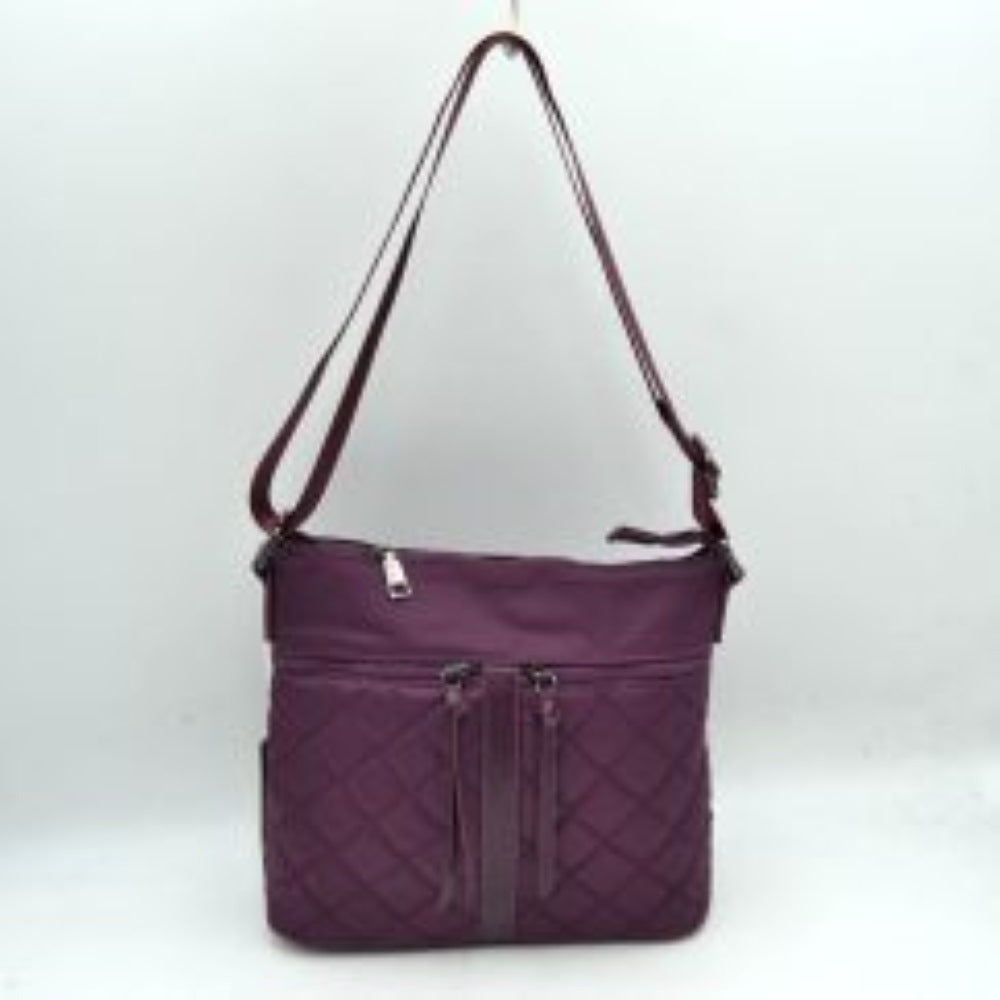 Purple his functional crossbody bag features a dual-texture nylon exterior in a deep navy blue, pairing a smooth upper panel with a classic diamond-quilted lower section. Perfect for organized everyday use, the front is designed with two vertical zipper pockets detailed with long fabric pulls alongside a central decorative stitched strip. Equipped with a secure top zipper closure to keep main compartment essentials safe