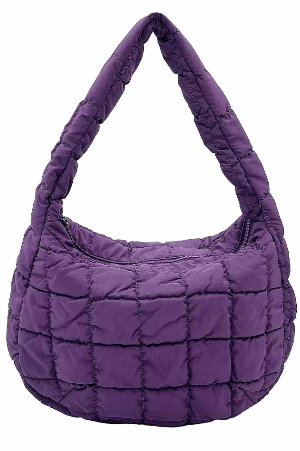 Purple Compact quilted bag crafted from durable 100% polyester with a timeless solid design. Measuring 8.7" x 11.8" x 3.15", it's the perfect size for everyday essentials, travel accessories, or as a versatile organizer. The quilted texture adds visual interest and subtle structure. Ideal for on-the-go convenience with a sleek, minimalist aesthetic that pairs effortlessly with any outfit.