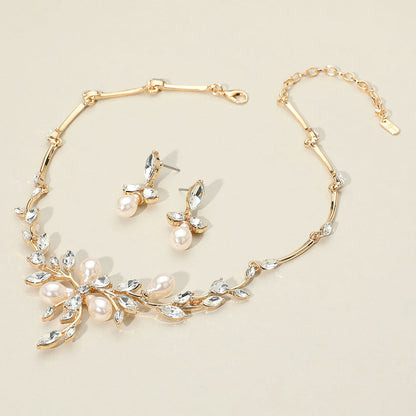 Madeline Love Clear, Gold Marquise Stone Cluster Pearl Embellished Leaf Branch Necklace - Necklaces
