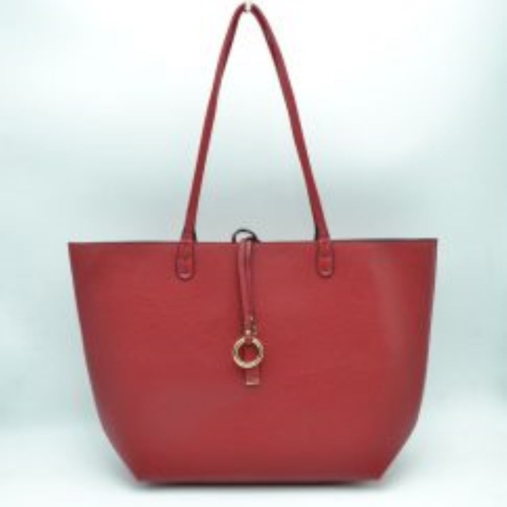 Red-Blue This classic tote bag features a smooth exterior finish with a timeless trapeze silhouette, offering an elegant look for everyday use. Designed with an open top for quick access, the spacious main compartment provides ample storage space for daily essentials. Dual slim shoulder handles are securely stitched to the upper panels, while a decorative central drawstring tie accents the front, complete with a metallic ring and matching tab accent for a polished touch.