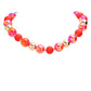 Red Chunky Glass Metal Ball Beaded Necklace is a stunning addition to any outfit. The chunky glass and metal balls provide a bold and eye-catching look, while the beaded design adds a touch of elegance. Made with high-quality materials, this necklace is both durable and stylish. Elevate your style with this statement piece.