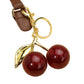 Red Glittered Cherry Bag Charm is the perfect accessory to add some sparkle to your bag. The glitter adds a touch of glam, while the cherry design is both playful and stylish. With this charm, your bag will not only stand out, but you'll also be on-trend. 