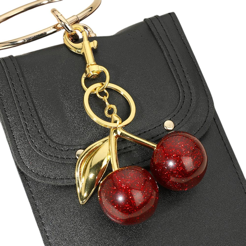 Red Glittered Cherry Bag Charm is the perfect accessory to add some sparkle to your bag. The glitter adds a touch of glam, while the cherry design is both playful and stylish. With this charm, your bag will not only stand out, but you'll also be on-trend. 