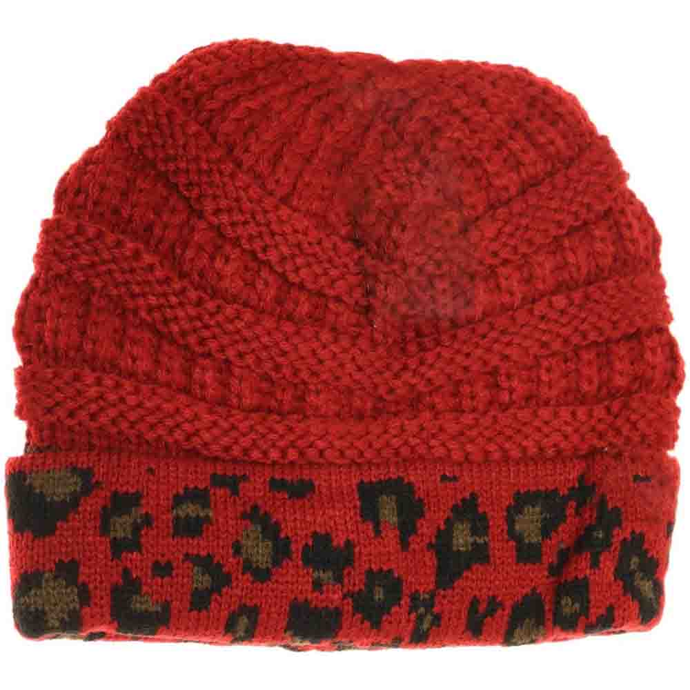 Red Kids Matching Cuff Leopard Print CC Beanie combines playful style with cozy warmth. Crafted from a soft knit fabric, this piece features a trendy leopard print pattern and a folded cuff accented by the classic CC logo. Ideal for chilly days, it keeps little heads comfortable while adding a fashionable touch to any outfit. Perfect for matching with adult styles, this beanie offers both practicality and a chic edge for young fashion enthusiasts. 