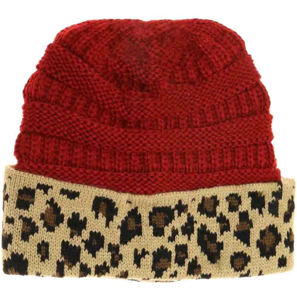 Red Leopard Print CC Beanie Tail combines stylish leopard patterning with practical design, featuring a convenient tail opening perfect for ponytails or buns. Crafted from soft, breathable fabric, this beanie ensures comfortable wear during colder days while keeping your hair effortlessly in place. Ideal for outdoor activities or casual outings, it offers a blend of fashion and function that enhances your winter wardrobe. 