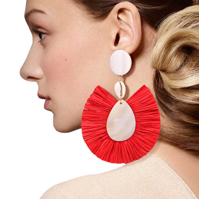 Red Puka Shell Mother of Pearl Teardrop Raffia Trimmed Earrings, adorn yourself with these teardrop raffia trimmed earrings! puka shell mother-of-pearl teardrop earrings go perfectly with a t-shirt, summer dress or work clothes, beach party, and many more. 