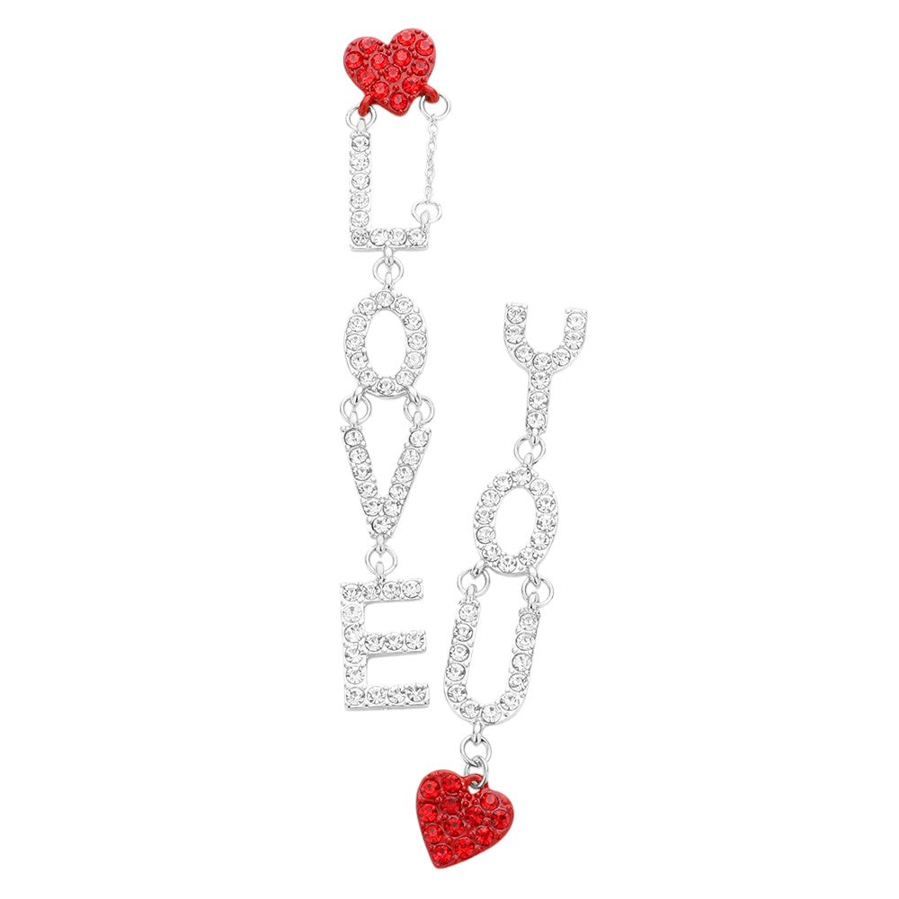 Red  Rhodium LOVE YOU Rhinestone Embellished Heart Message Mismatched Dangle Earrings are the perfect way to add a touch of romance and glamour to any outfit. Crafted with high-quality materials, these earrings feature rhinestone embellishments and a mismatched design that adds a unique twist. Show your love in style with these statement earrings.