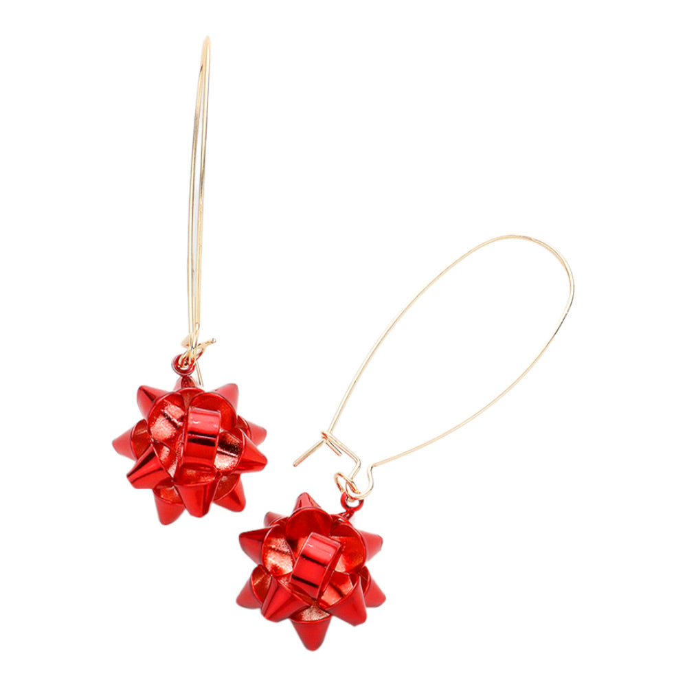 Red Trendy Christmas Gift Bow Dangle Earrings, are beautifully designed with a bow theme that will make a glowing touch on everyone. These beautiful earrings are the ultimate representation of your class & beauty. These are the perfect gift for Christmas, especially for your friends, family, and the persons you love.