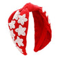 Red White Get ready for the game with this Game Day Seed Beaded ACE Message Star Knot Burnout Headband. Crafted with soft material and adorned with seed beading, an ACE message, and a star knot, this headband is perfect for making a statement and staying comfortable at the same time. Cheer up your favorite team with this.