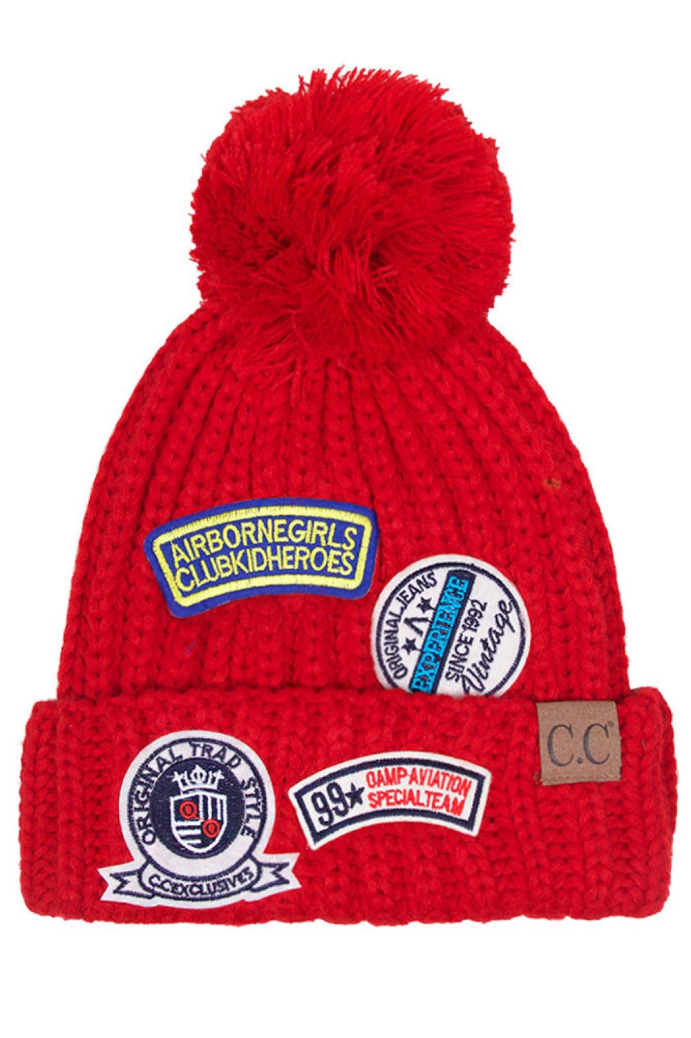 Red Stay warm in style with the C.C Fashion Pom Beanie With Patch. Crafted from 100% soft acrylic, this cozy beanie delivers exceptional comfort and durability for everyday wear. The signature pom pom adds a playful touch, while the decorative patch showcases timeless fashion appeal. One size fits most, making it the perfect accessory for anyone seeking quality and versatility. Whether you're heading outdoors or running errands, this beanie combines practicality with contemporary design.