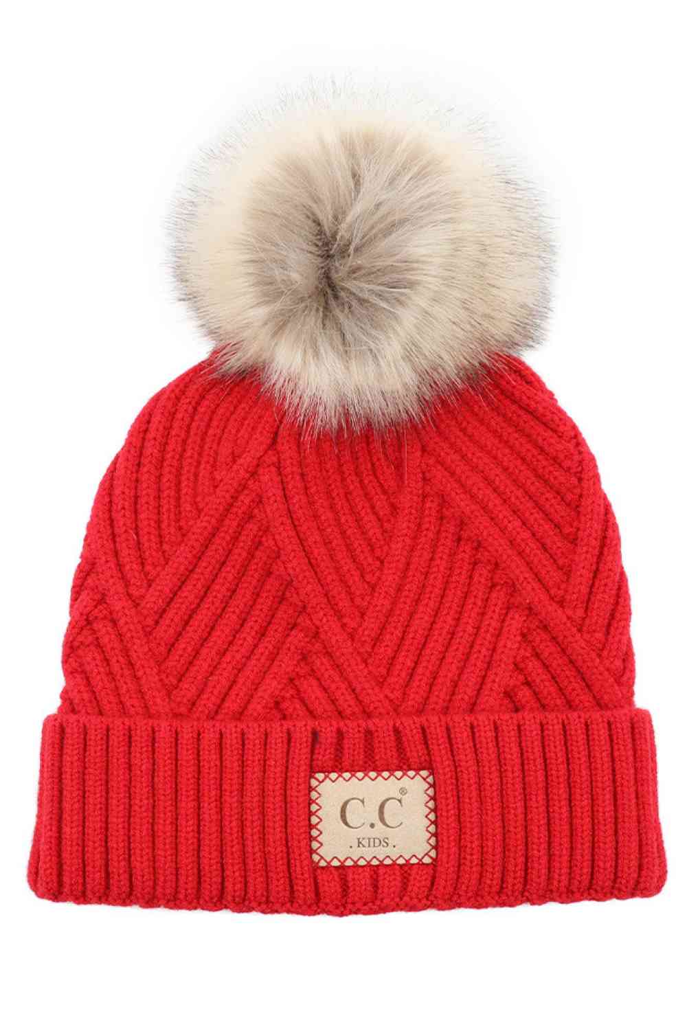 Red Keep your little one cozy with this C.C Kids Knit Beanie, featuring a playful diagonal stripes criss-cross pattern. Crafted from a soft blend of 47% rayon, 31% PBT, and 22% nylon, this beanie offers warmth and durability for everyday wear.