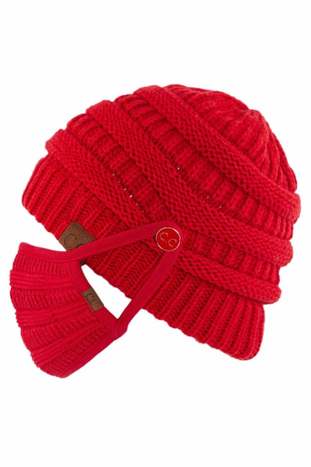 Red Stay warm and functional with this C.C Ribbed Knit Beanie featuring a convenient button attachment for your mask. Crafted from 100% acrylic, this lightweight beanie offers soft comfort and durability for everyday wear.