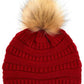 Red Stay warm and cozy with this classic C.C Pom Pom Knit Beanie, crafted from 100% soft acrylic for all-day comfort. The ribbed knit design adds texture and durability, while the signature pom pom on top brings a playful touch to any winter outfit. One size fits most, making it the perfect accessory for everyone. Ideal for cold weather adventures or casual everyday wear.