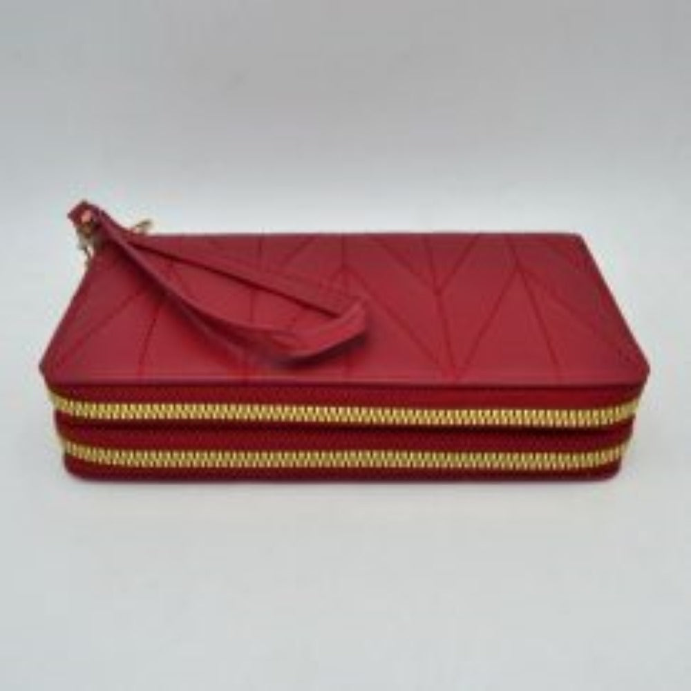 Red This rectangular long wallet features a distinctive geometric stitched pattern across its exterior, providing a refined and structured look for everyday use. Designed to offer organized storage compartments, it incorporates a dual zip-around closure system with prominent metallic zippers to keep essentials secure. A matching, detachable flat wristlet strap is connected to the side hardware with a metallic clasp, providing an easy and convenient hands-free carrying style.