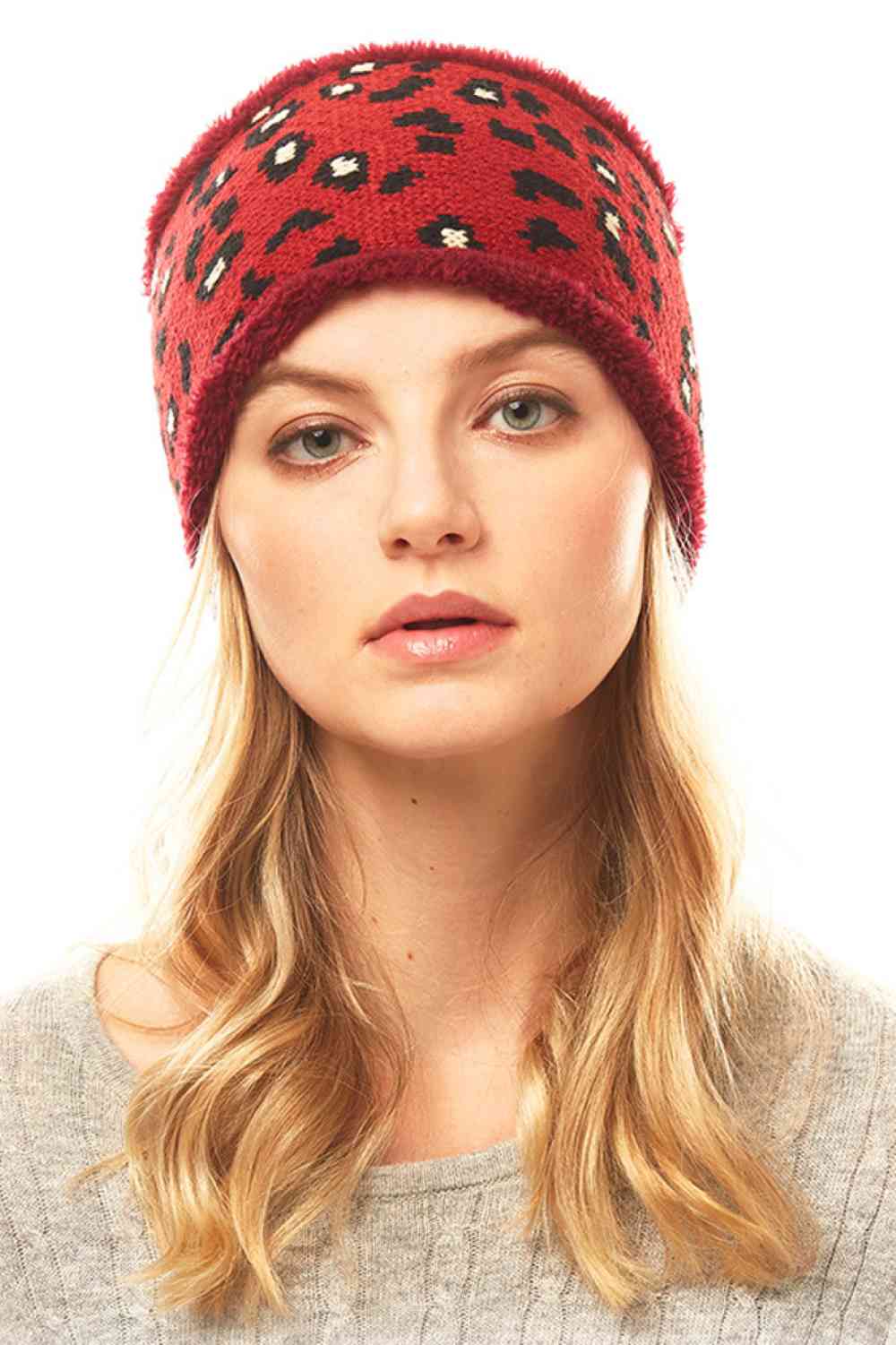 Red Stay stylish with this eye-catching Leopard Print Headband. Crafted from a comfortable blend of 50% polyester and 50% acrylic, this versatile accessory measures 4" x 10" and fits one size. Perfect for keeping hair in place while adding a bold fashion statement to any outfit. Whether you're heading to the gym, running errands, or just want an instant style upgrade, this headband delivers both function and flair.