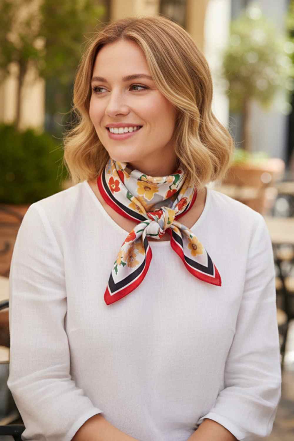 Red Elevate your accessory game with this versatile bandana scarf featuring vibrant floral and geometric patterns. Crafted from 100% lightweight polyester with a silky finish, it drapes beautifully and feels luxurious against your skin. The generous 27.5" x 27.5" square size offers endless styling possibilities wear it as a headscarf, neck wrap, or tie it to your bag for an instant pop of color. Perfect for all seasons, this easy-care piece transitions seamlessly from casual to chic. An essential addition t