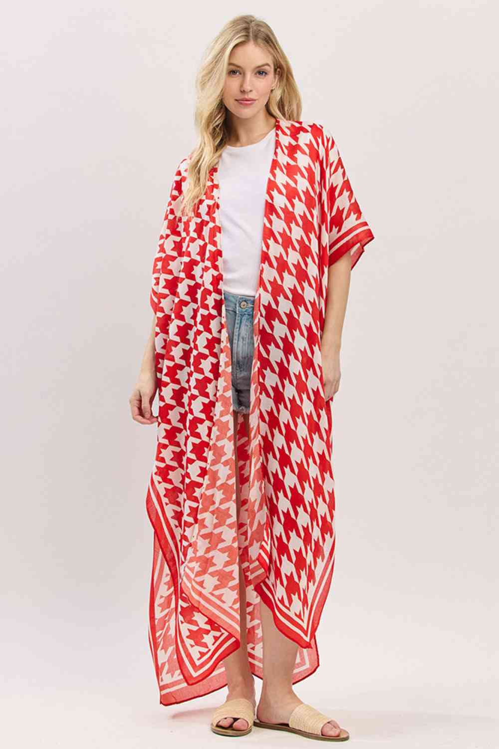 Red White Effortless summer style meets timeless elegance with this houndstooth pattern kimono. The open front design drapes beautifully over swimwear or casual outfits, while the generous 35" x 47.5" dimensions provide complete coverage for beach days and poolside lounging. Crafted from lightweight 100% polyester, it's breathable, quick-drying, and easy to care for. Perfect for layering over your favorite beach look or wearing as a standalone cover-up. Transition seamlessly from sand to dinner with this ve