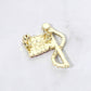 Gold Statement flag inspired brooch designed with a flowing ribbon silhouette and shimmering rhinestone accents. A bold decorative accessory ideal for jackets, coats, scarves, hats, bags, and event outfits. Perfect for patriotic celebrations, themed events, gifting, or adding eye catching detail to everyday styling.
