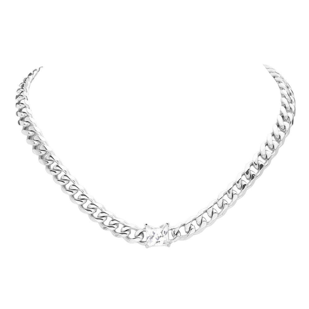 Rhodium 18K Gold Dipped Stainless Steel CZ Square Stone Accented Necklace features high-quality stainless steel dipped in 18K gold, adorned with a beautifully sparkling CZ square stone. Crafted with precision and durability, this elegant necklace is perfect for any occasion. Enjoy the luxurious shine of gold and the lasting strength of stainless steel, making it a timeless addition to your collection. 