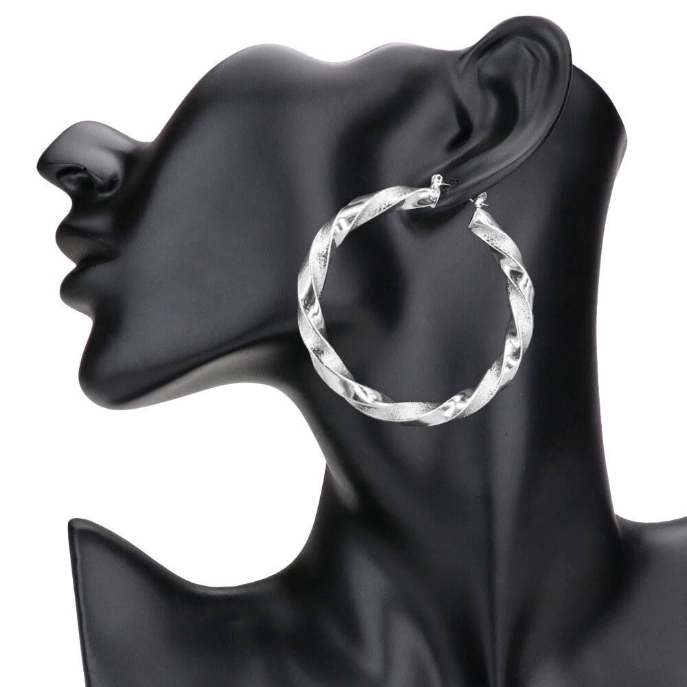 Rhodium 2.3 Inch Twisted Metal Hoop Pin Catch Earrings, turn your ears into a chic fashion statement with these twisted metal hoop earrings! The beautifully crafted design adds a gorgeous glow to any outfit. Put on a pop of color to complete your ensemble in perfect style. These adorable hoop pin catch earrings are bound to cause a smile. 